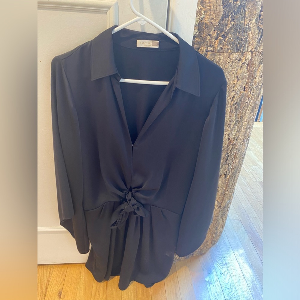 Ramy Brook size medium great black dress. It’s polyester. Lined. Looks silky.